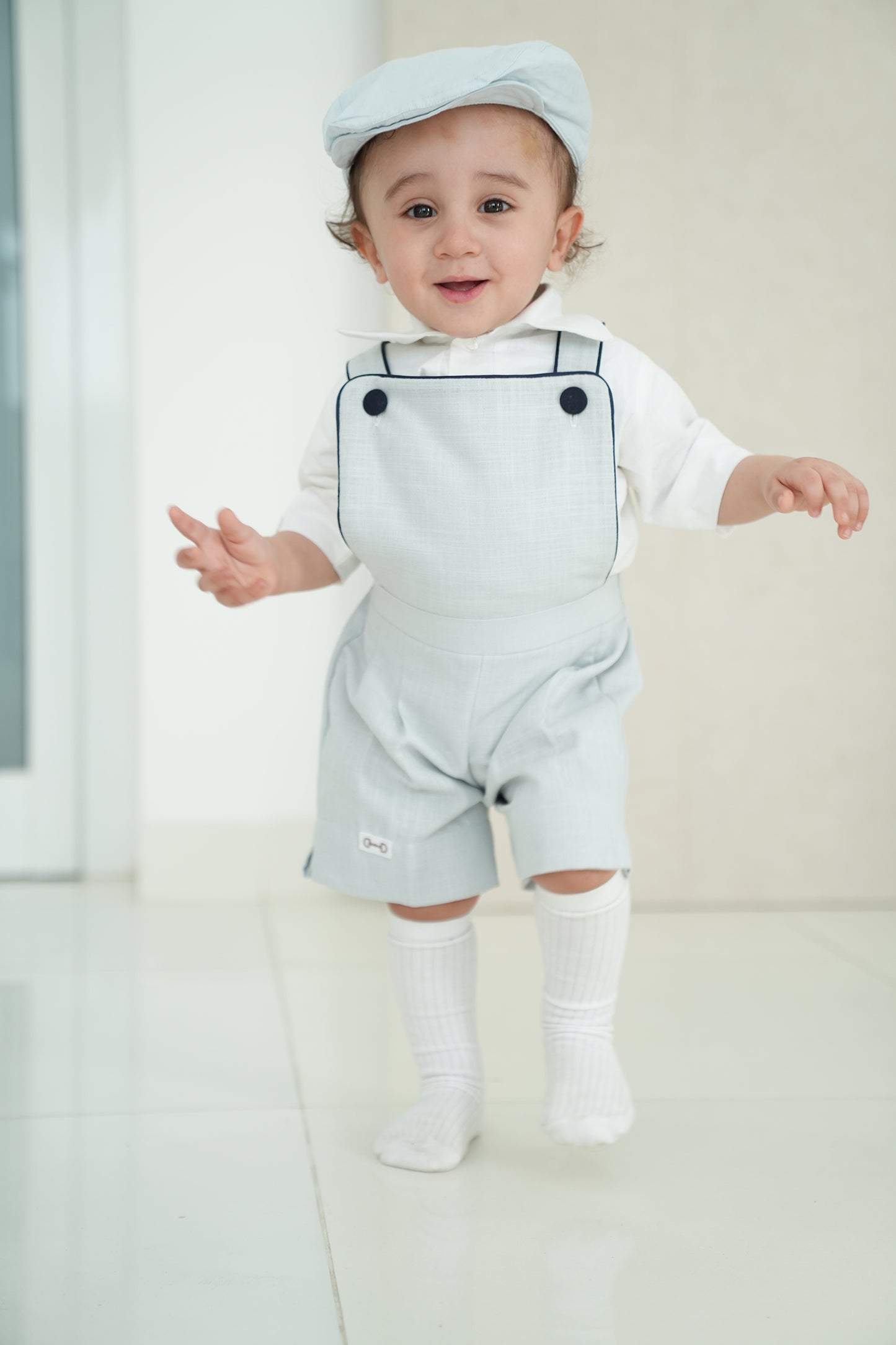 Baby blue piping romper